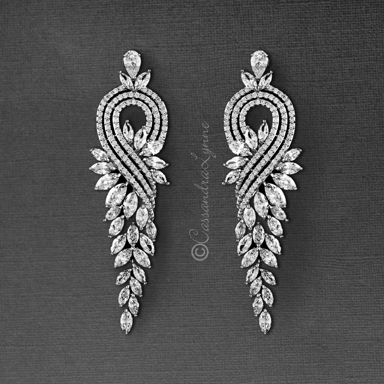 Elegant CZ Earrings with Leaf Drape and Swirl