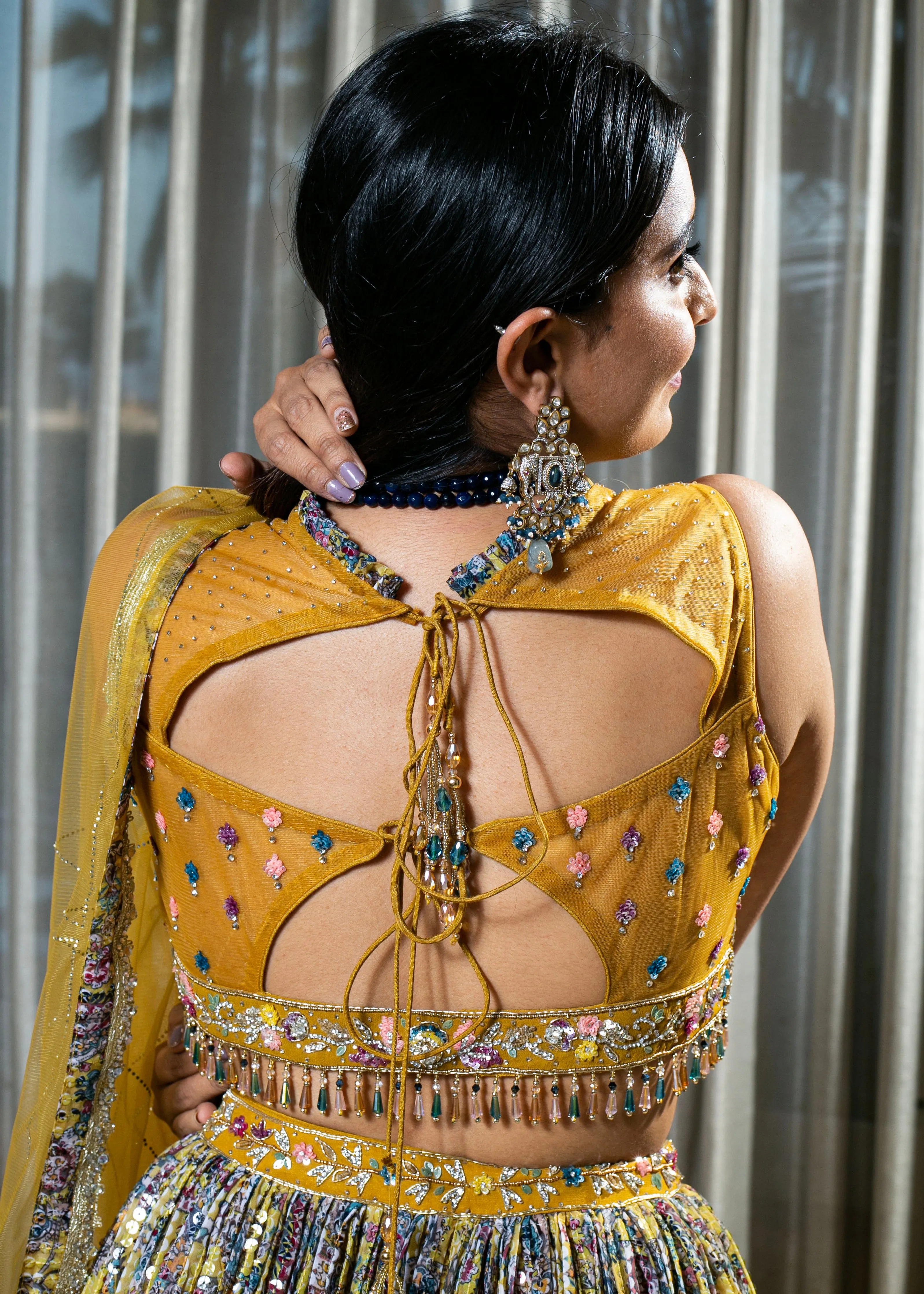 Flared Yellow Lehenga with Intricate Embroidery and Net Dupatta